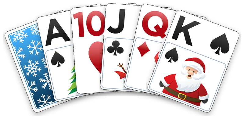 The Christmas deck: its card back, then the ace, ten, jack, queen and king.
