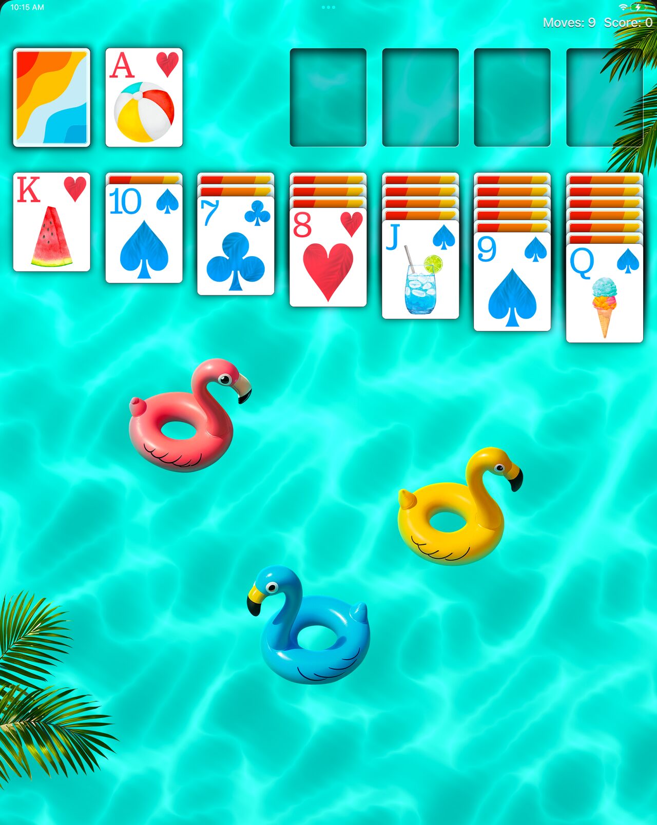 Real Solitaire on iPad with the Pool Party theme: flamingo floats on turquoise water under palm fronds.
